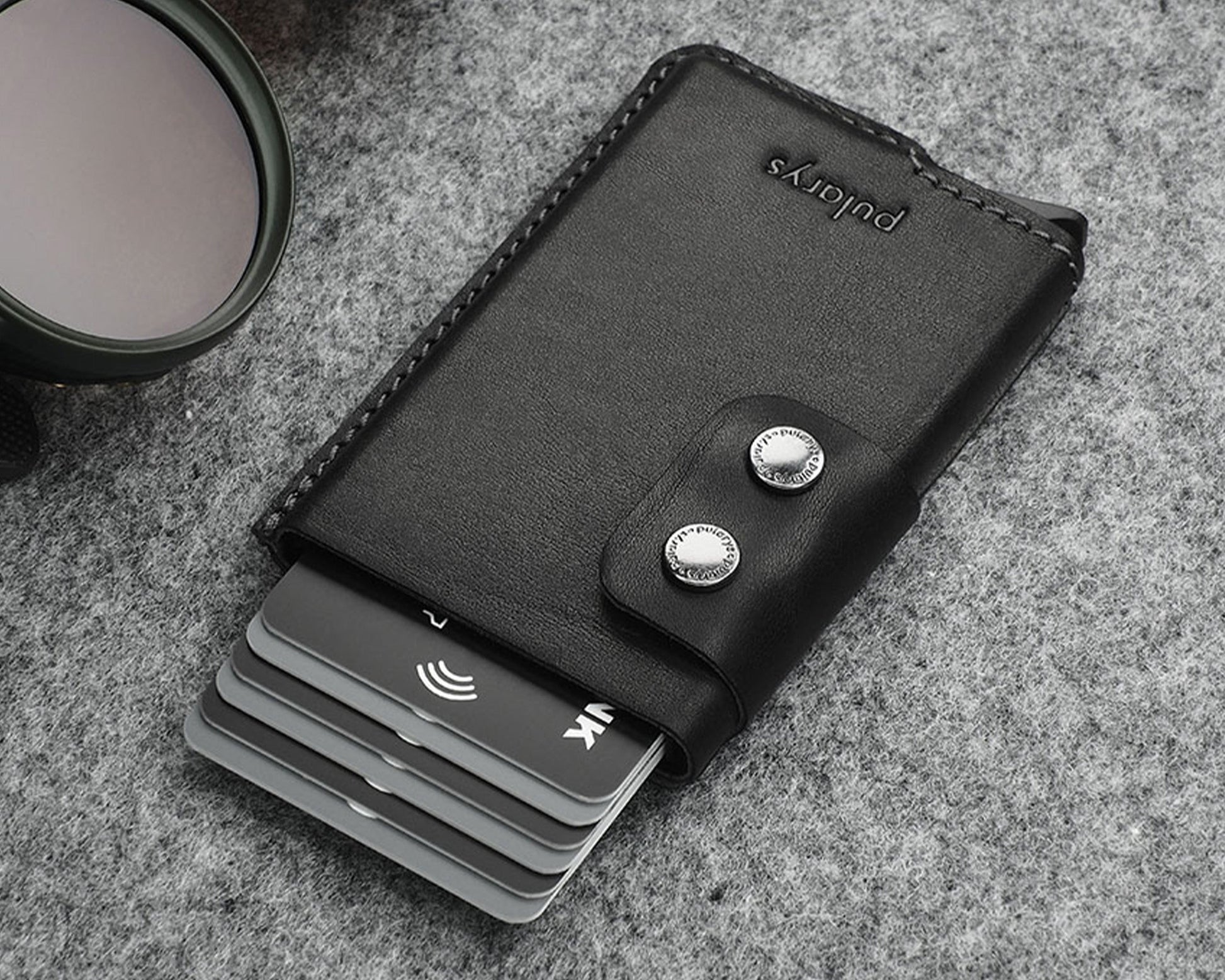 Pularys - FUNKY RFID Wallet Black on a desk